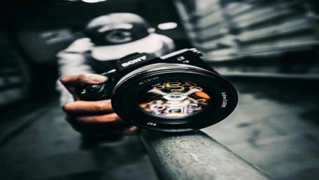 Focus Through the Lens: Sony Camera Close-Up wallpaper