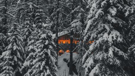 Winter Retreat in a Snowy Cabin Forest wallpaper