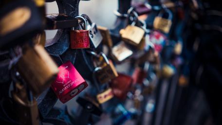 Colorful Locks of Love in Urban Setting wallpaper