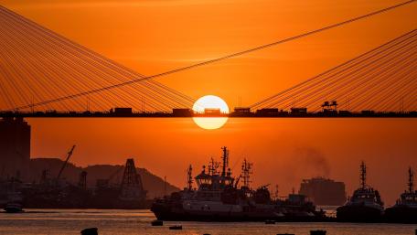 Battlecruiser Under a Fiery Sunset wallpaper