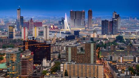 Cityscape at Dusk with Beautiful Skyline and Waterway View wallpaper