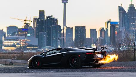 Speed and Power Against the City Skyline wallpaper