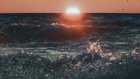 Sunrise over Ocean Waves wallpaper