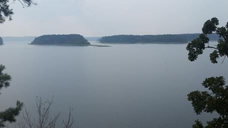 Tranquil Waters Under a Misty Sky wallpaper