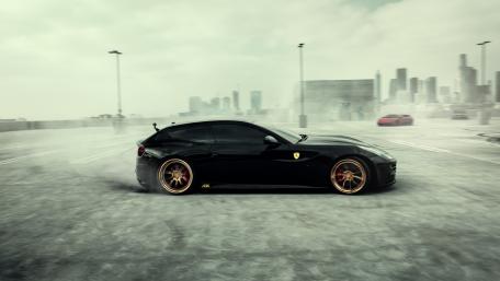 Sleek Black Ferrari Gliding Through Cityscape wallpaper