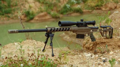 Precision Rifle in Natural Surroundings wallpaper