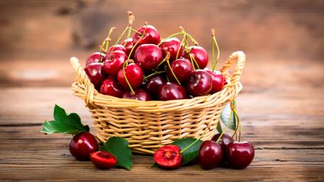 Sweet and Fresh Basket of Cherries wallpaper