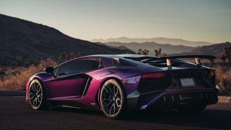 Sunset Silhouette of a Sleek Lamborghini wallpaper