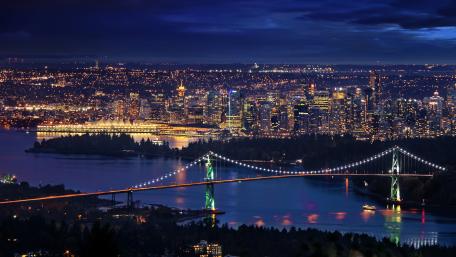 Stunning Nighttime Cityscape with Bridge Reflection wallpaper