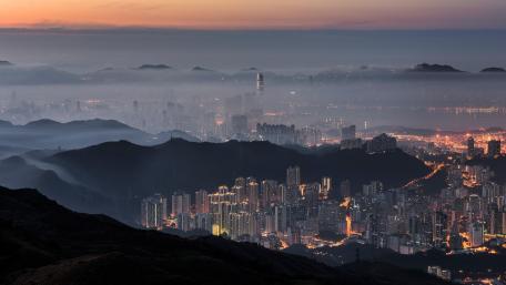 Mystic Dawn Over Cityscape wallpaper