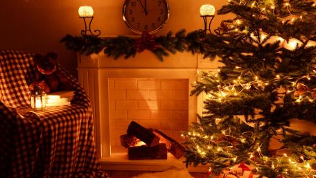 Cozy Christmas Evening by the Fireplace wallpaper