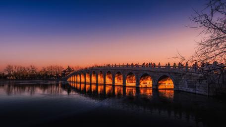 Evening Glow Over the River Bridge wallpaper