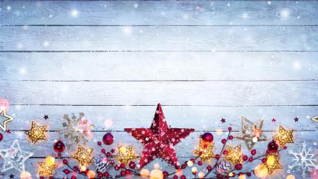 Christmas Magic: Festive Red Star on Wooden Planks wallpaper