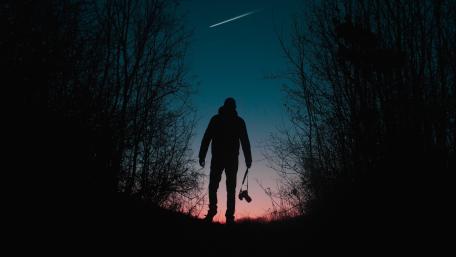 Lone Observer Under a Shooting Star wallpaper