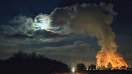 Lit Moon vs Smoldering Power Plant wallpaper