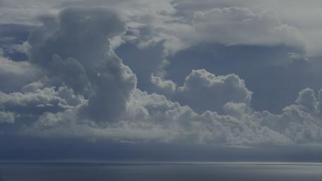 Serene Ocean Clouds Under Blue Sky Clarity wallpaper