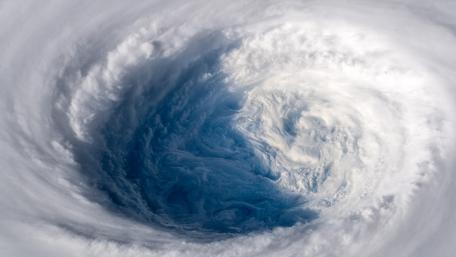 Swirling clouds from above wallpaper