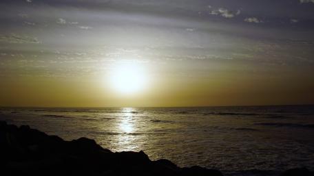 Sunset by the sea in Banjul, Gambia wallpaper