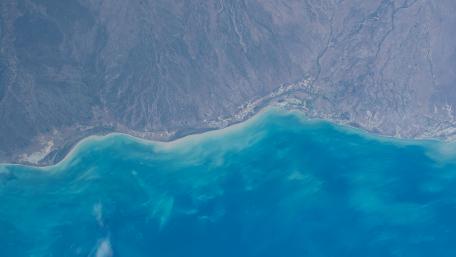 Aerial Tranquility by the Coastal Edge wallpaper