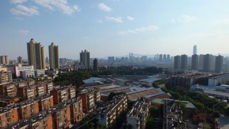 Urban Skyline with Modern Architecture and Historical Structures wallpaper