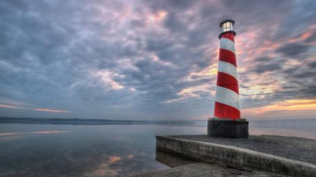Lighthouse under a Serene Sky wallpaper