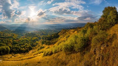 Majestic Hills Bathed in Golden Light wallpaper
