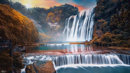 Majestic Cascade at Sunset wallpaper
