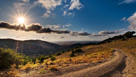 Stunning Sunset Over Rolling Hills wallpaper