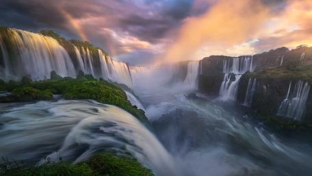 Majestic Waterfalls Under a Colorful Sky wallpaper