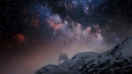 Majestic Mountains Under the Milky Way Night Sky wallpaper