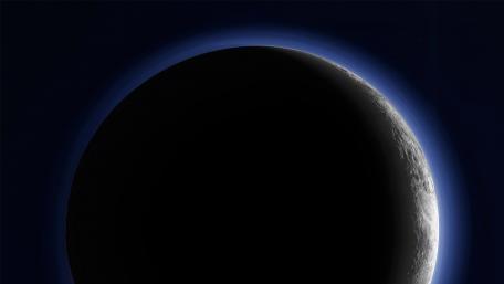 Mysterious Dark Planet Overlooked by Starlit Sky wallpaper