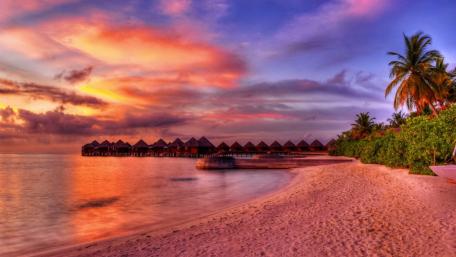 Tropical Sunset at Bungalow Beach Retreat wallpaper