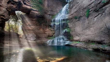 Serene Waterfall at La Foradada in Spain wallpaper