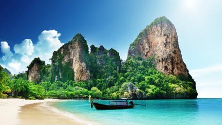 Serene Thai Landscape with Boat and Mountains wallpaper