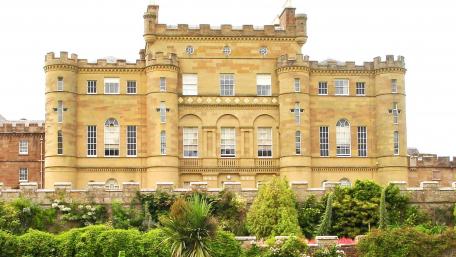 Majestic Culzean Castle Surrounded by Lush Gardens wallpaper