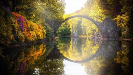 Rakotzbrücke Arch Reflecting in Tranquil Waters wallpaper