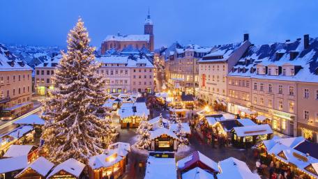 Enchanting Winter Christmas Market Scene wallpaper