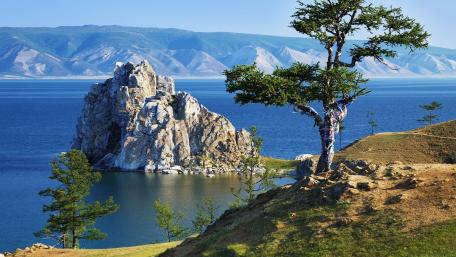 Majestic Lake View with Rock Formation and Tree wallpaper
