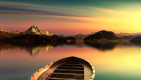 Tranquil Boat on a Serene Lake at Sunset wallpaper