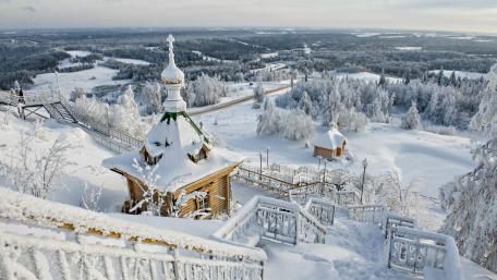 Winter Wonderland Overlooking a Snowy Cityscape wallpaper