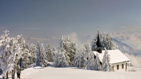 Winter Serenity at a Snowy Temple Scene wallpaper