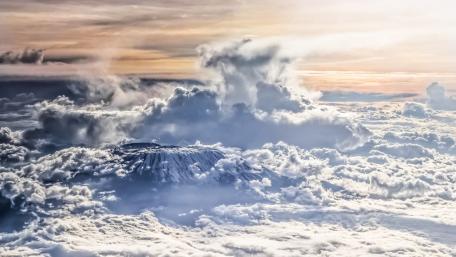 Majestic Mountain Above the Clouds wallpaper
