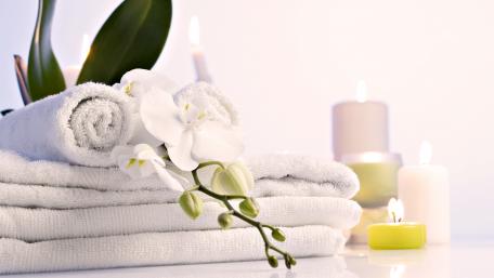 Serene Spa Vibe with Elegant Orchids and Towels wallpaper