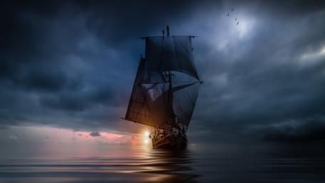 Mysterious Ship Sailing at Dusk wallpaper