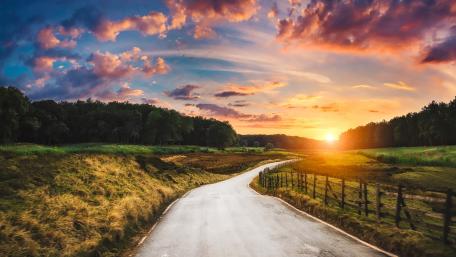 Winding Road Through Countryside Beauty wallpaper