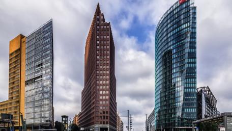Modern City Skyline with Unique Architecture Features wallpaper
