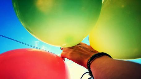 Colorful Balloons Under a Bright Sky wallpaper