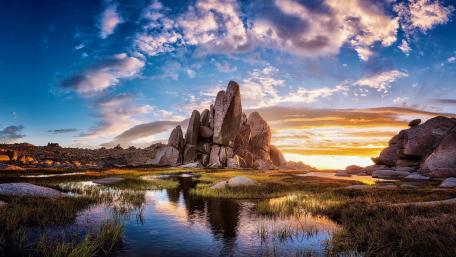 Majestic Rocks Under a Colorful Sky wallpaper