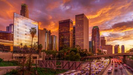 Stunning Sunset Over a Bustling Cityscape wallpaper