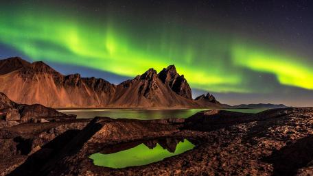 Vatnajokull National Park under the polar lights wallpaper